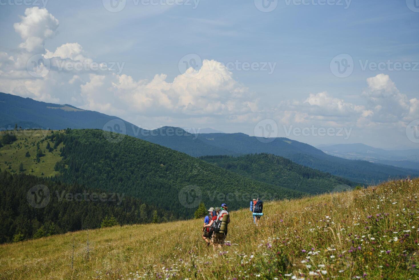 Hiking team in the mountains. travel sport lifestyle concept photo