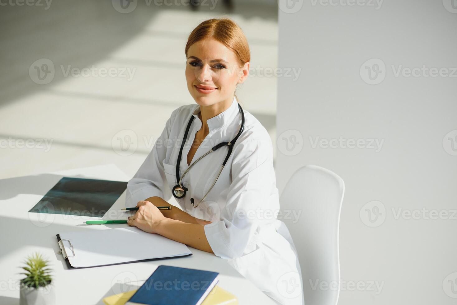 Medical doctor woman in the office. photo