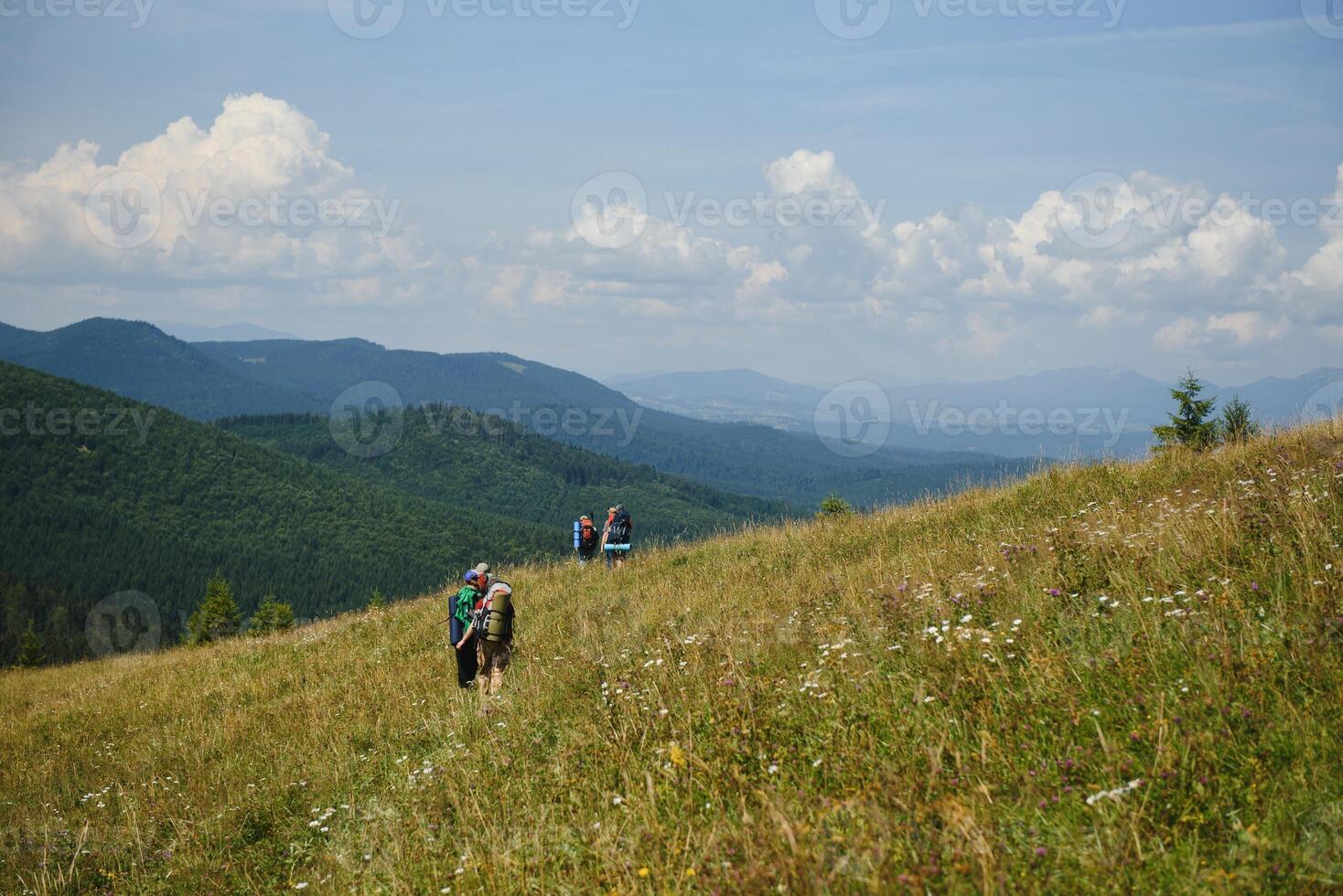 Hiking team in the mountains. travel sport lifestyle concept photo