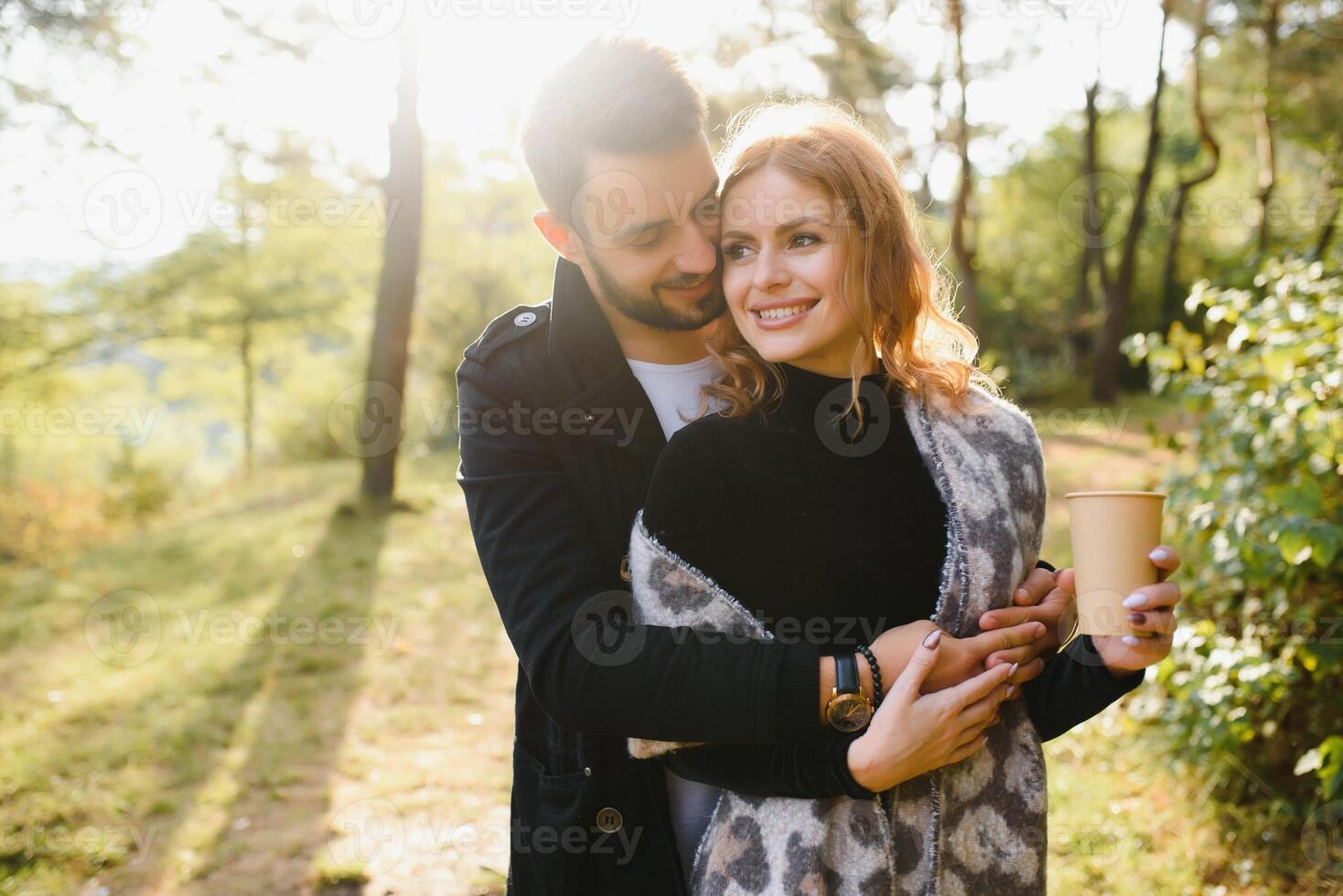 Happy young couple in love at the park photo