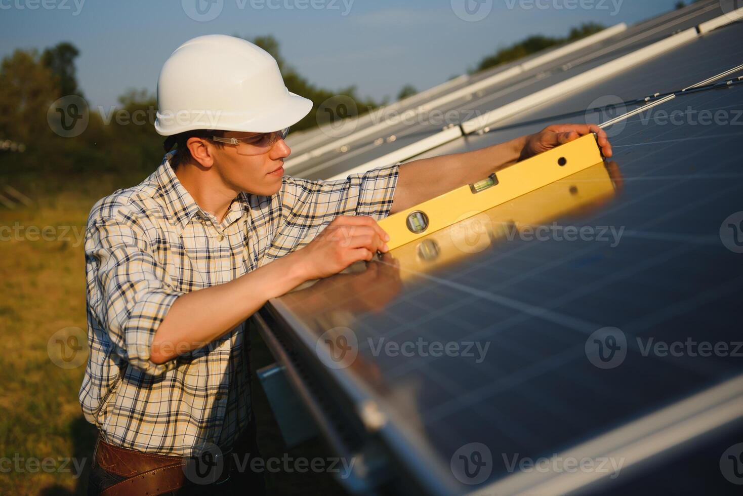 Renewable energy and solar power concept, worker or Electrical engineers are checking and training installing photovoltaic plant in solar power station alternative energy from nature photo