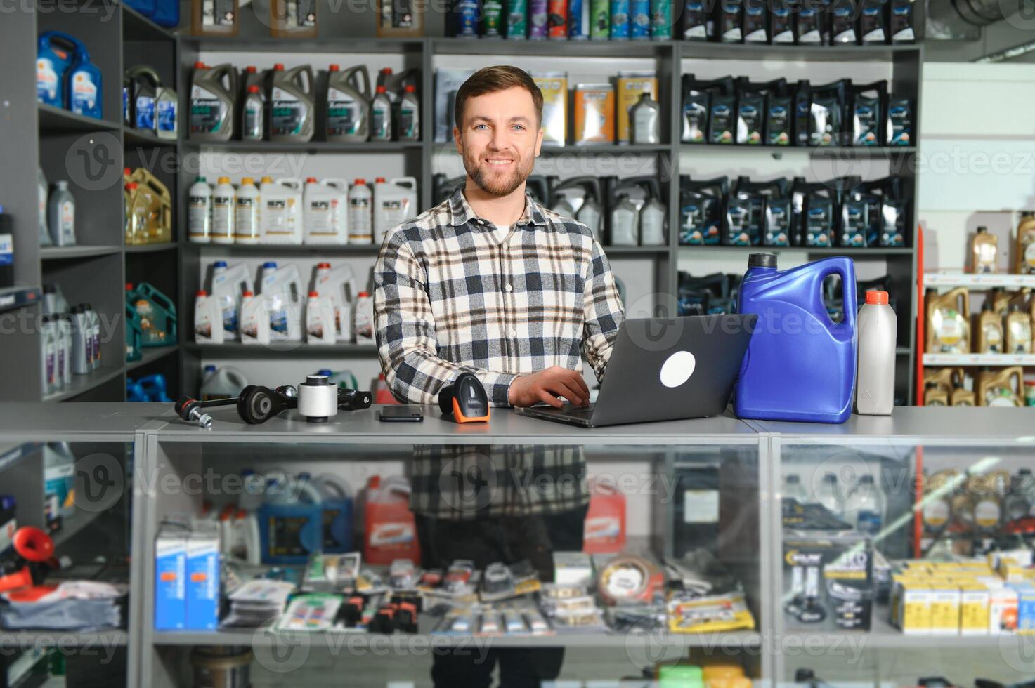 Smiling Salesman Auto Parts Store photo