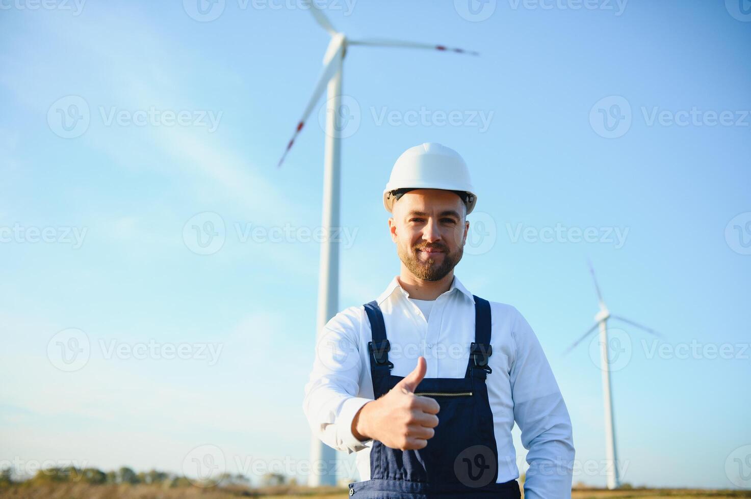 Windmill engineer inspection and progress check wind turbine photo