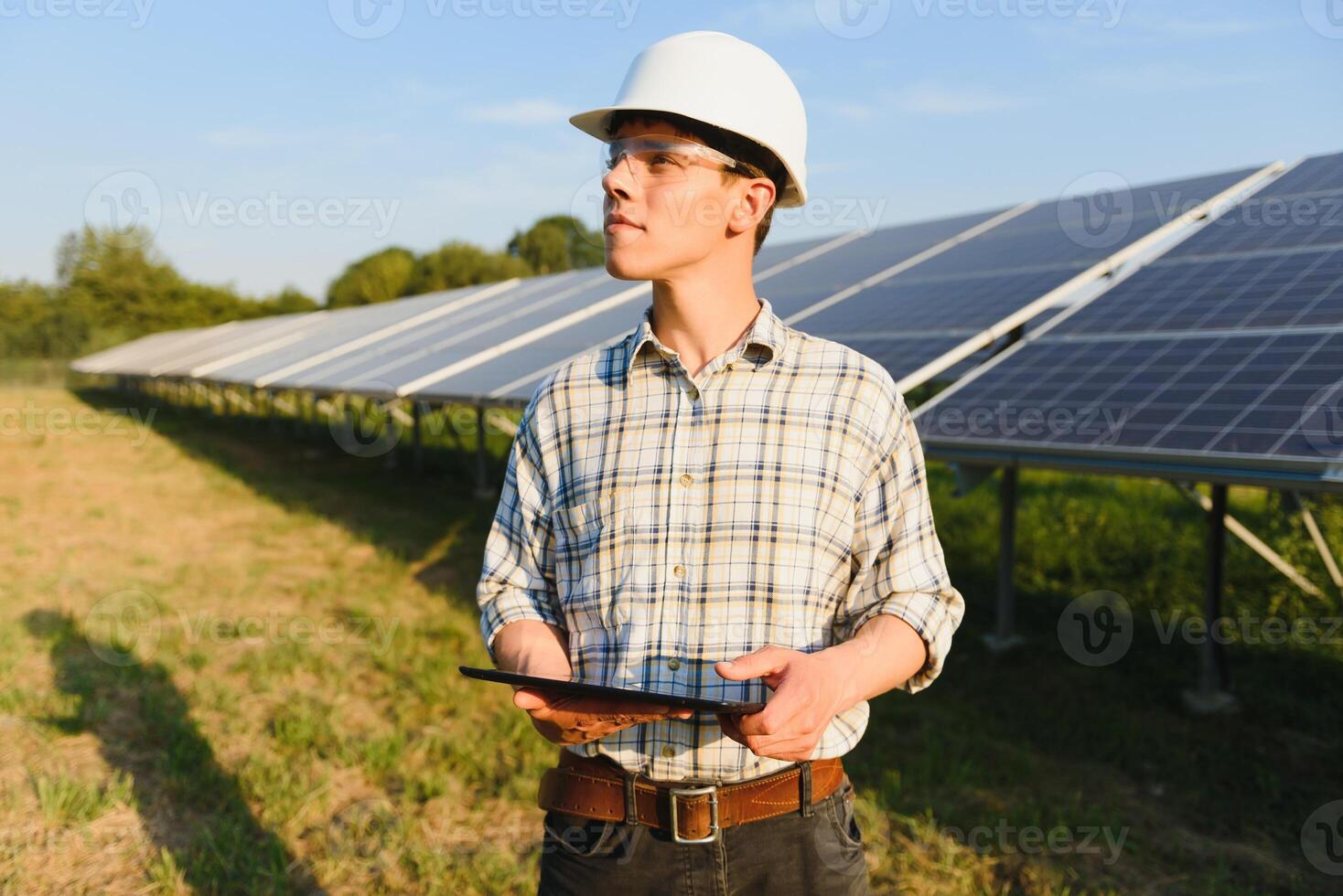 Renewable energy and solar power concept, worker or Electrical engineers are checking and training installing photovoltaic plant in solar power station alternative energy from nature photo