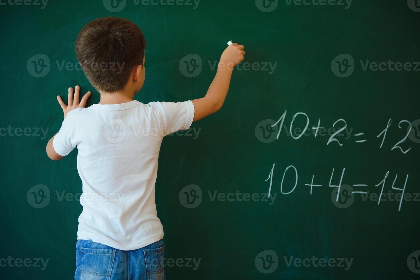 portrait of a schoolboy at the Board photo