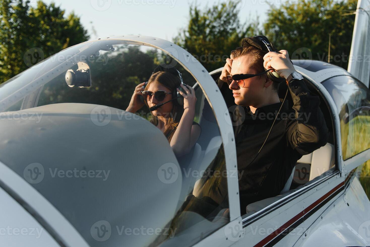 Female pilot of a light aircraft photo