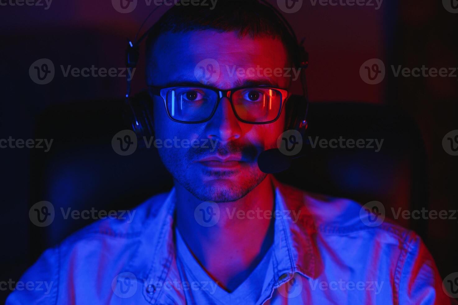 Gamer playing a first person shooter on high end pc. photo