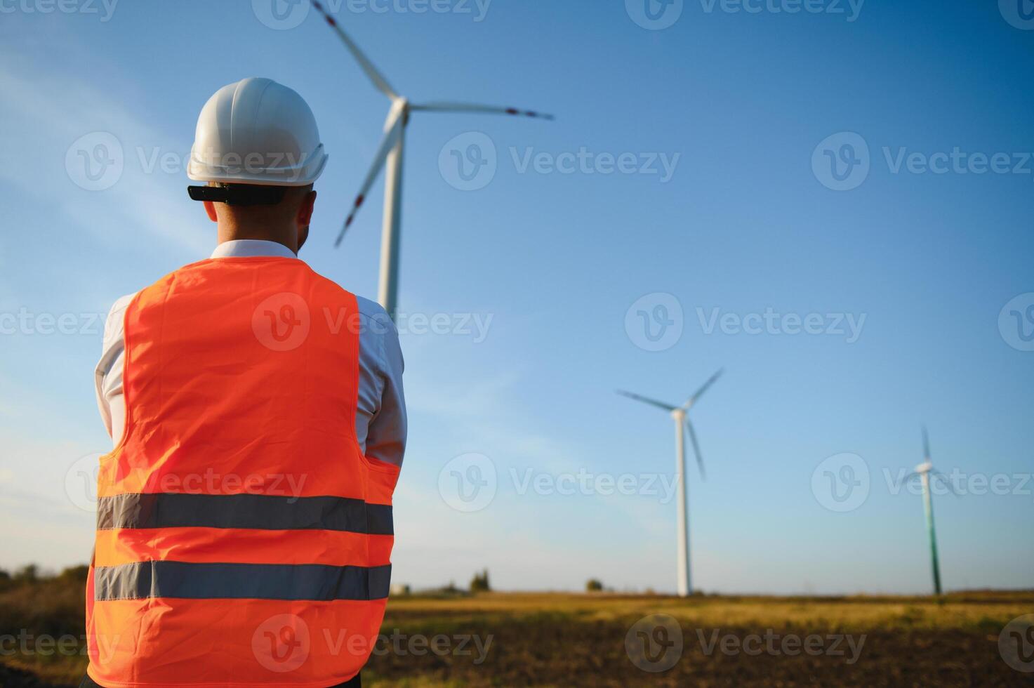 Windmill engineer inspection and progress check wind turbine photo