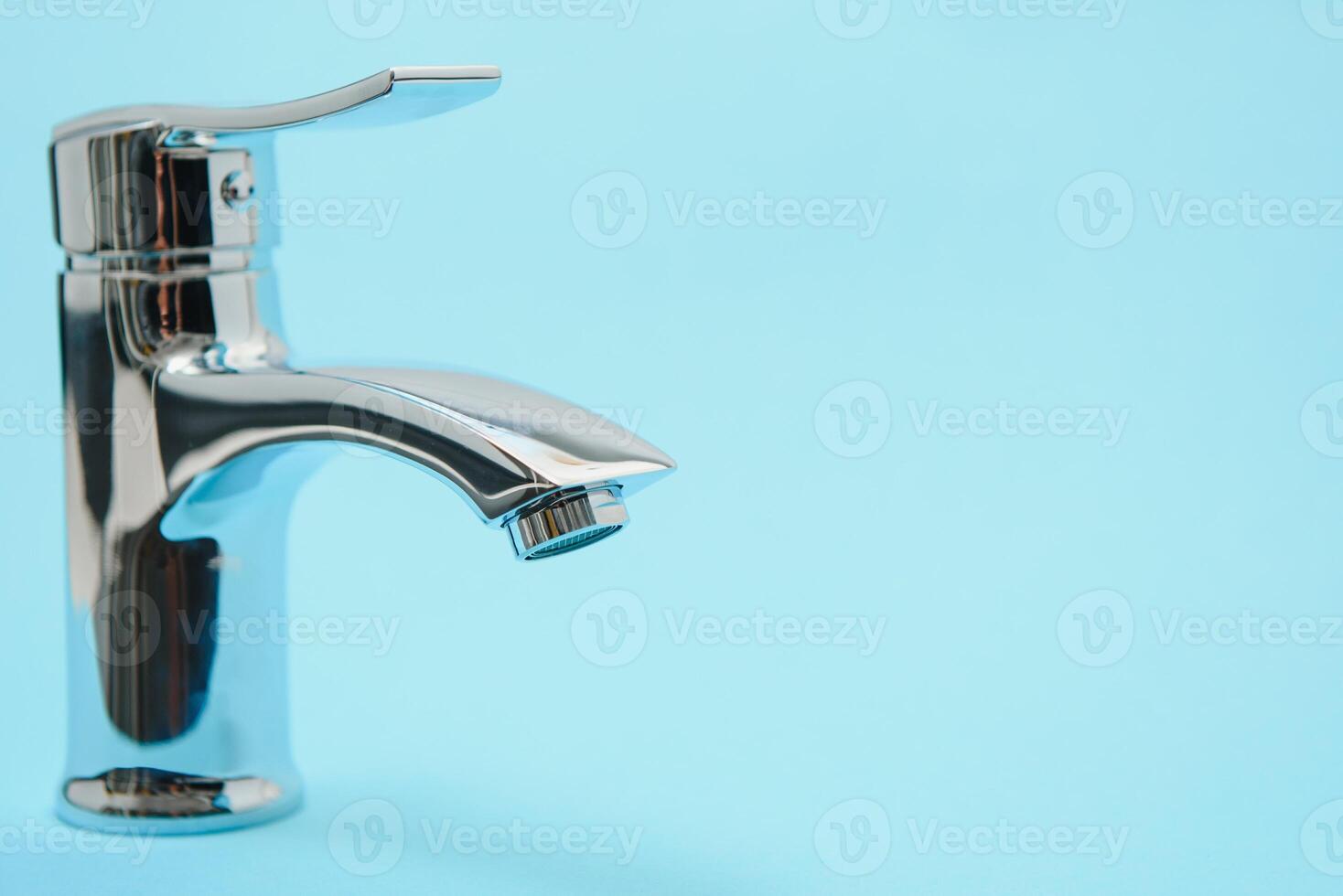 New chrome or steel mixer tap for bathroom sinks photo