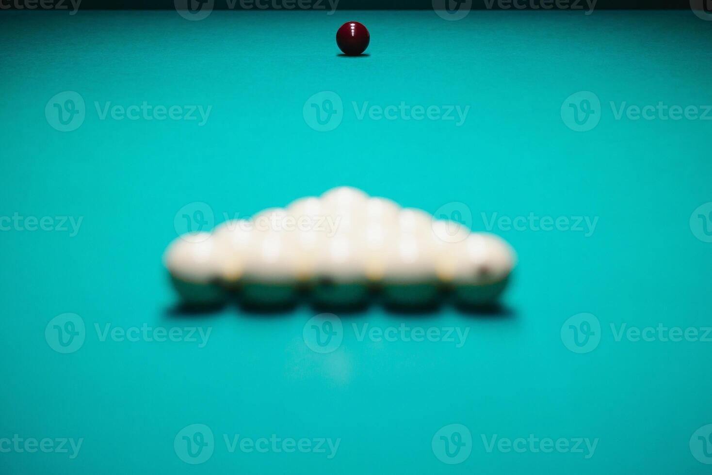 White billiard balls for Russian billiards, in a triangle on the table. photo