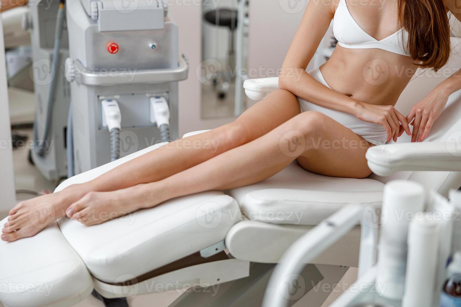 Cropped shot of young woman with perfect smooth skin during beauty procedures photo
