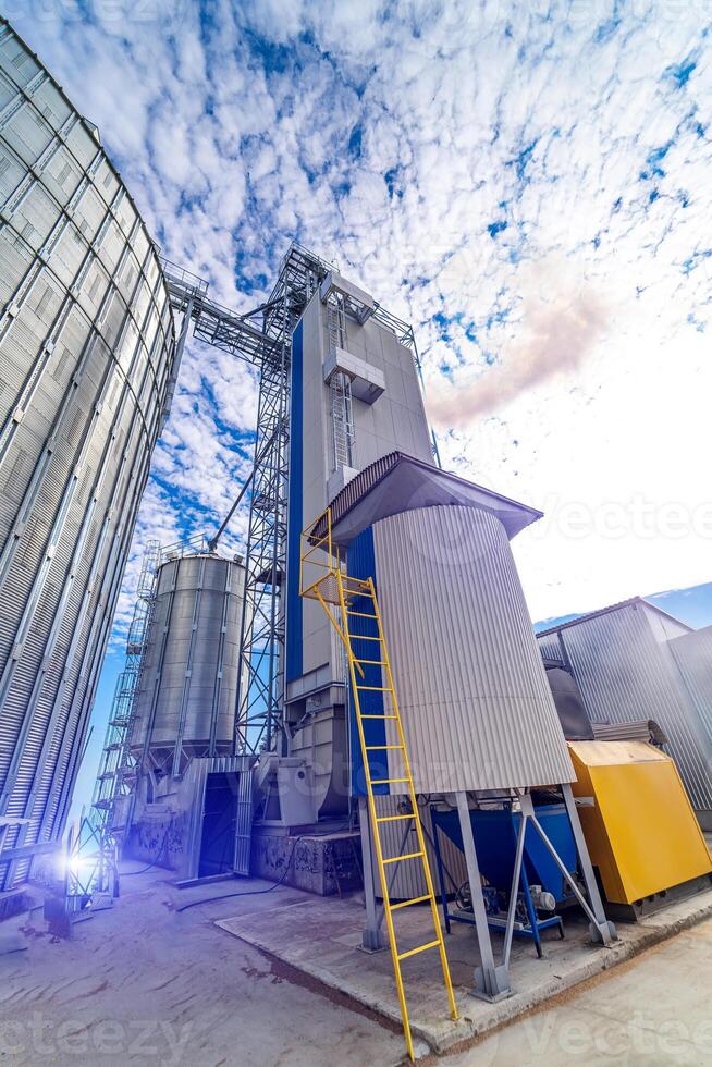 Storage construction silo tanks. Huge metal industrial containers. photo