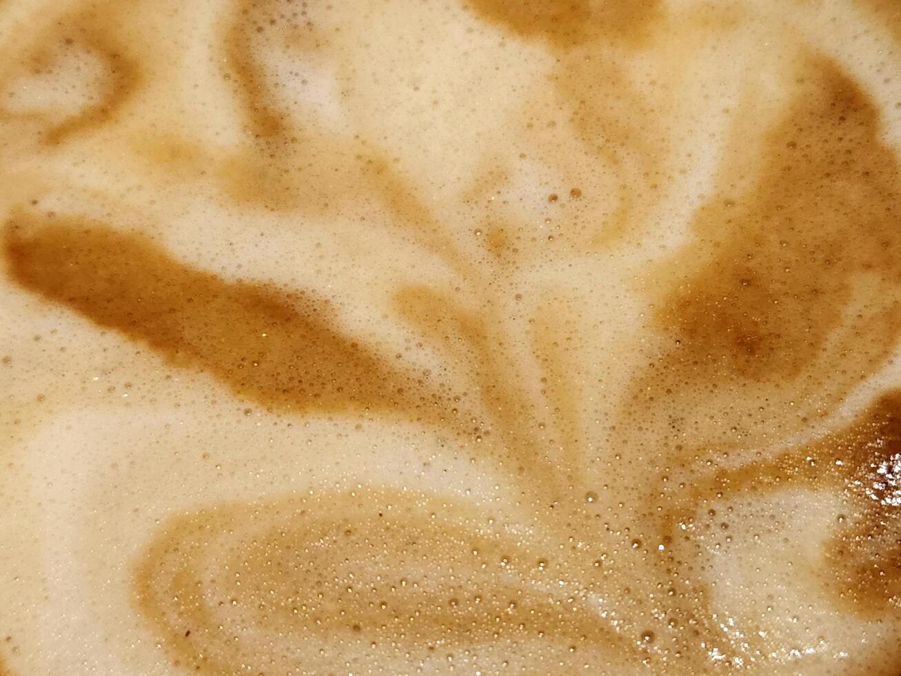 Coffee foam. Texture of coffee foam. Abstract background photo