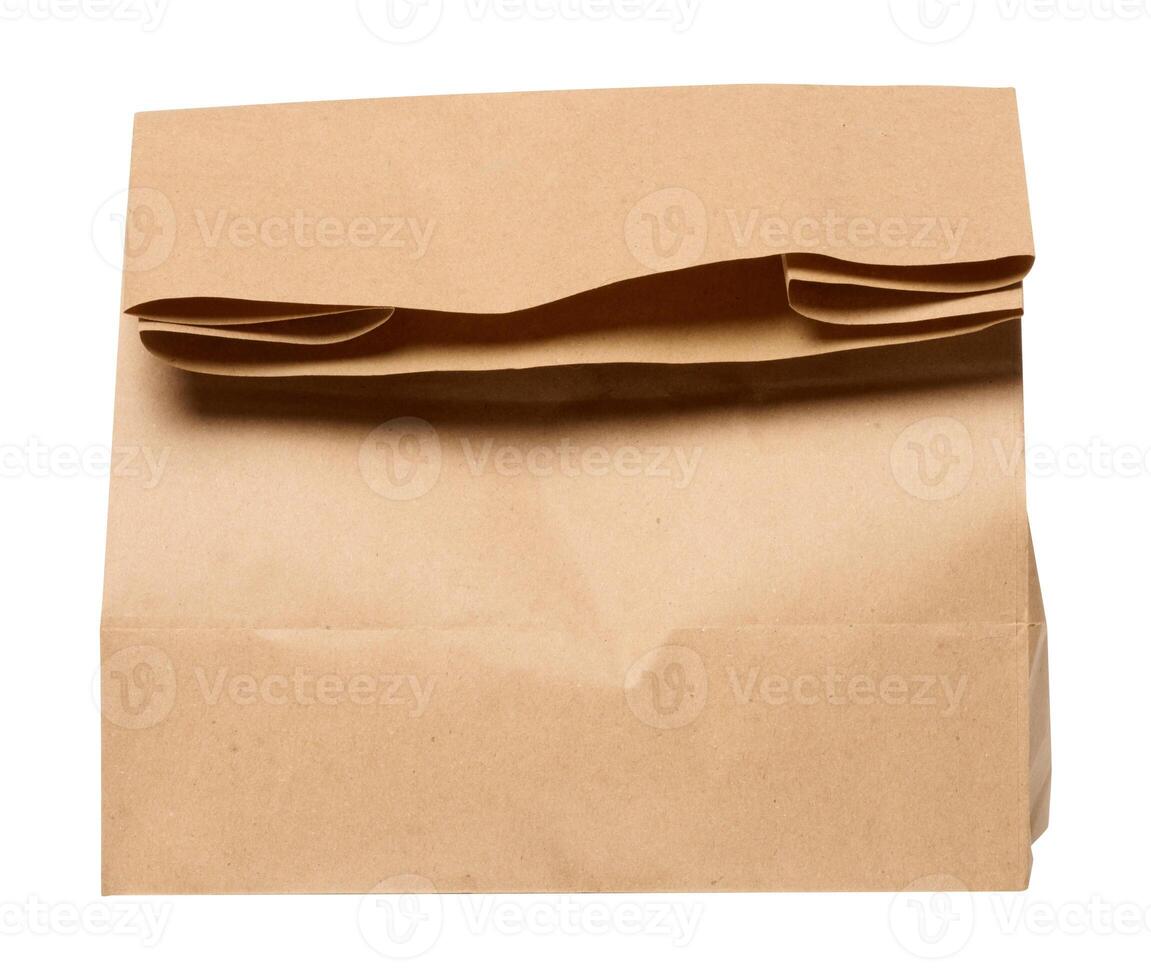 A large empty brown kraft paper bag for packaging products in stores photo
