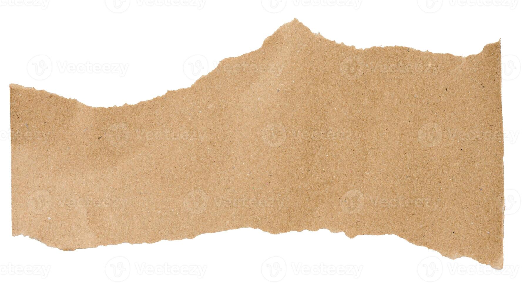 Torn piece of brown cardboard on a white isolated background photo