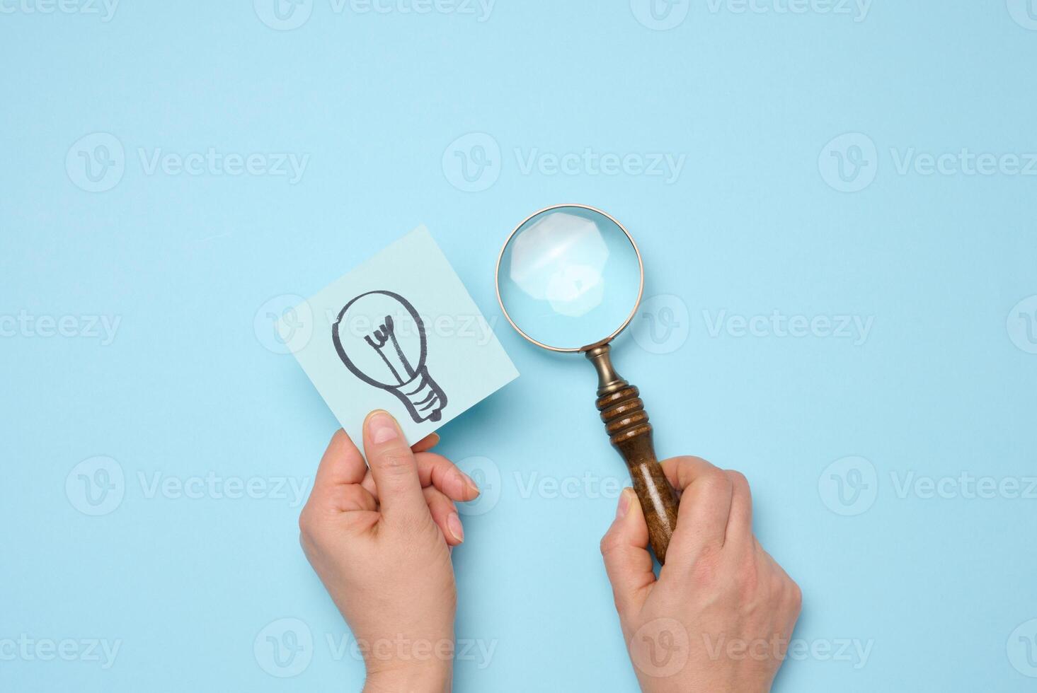 Drawn electric lamps on stickers, concept of searching for new ideas, brainstorming. photo