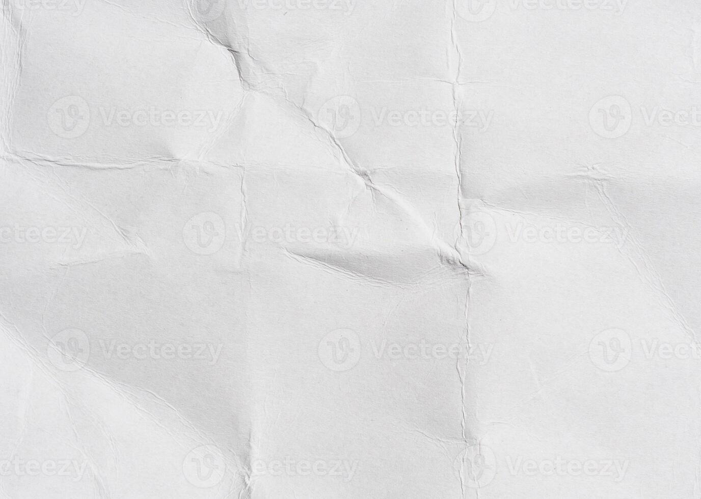Crumpled sheet of white cardboard photo