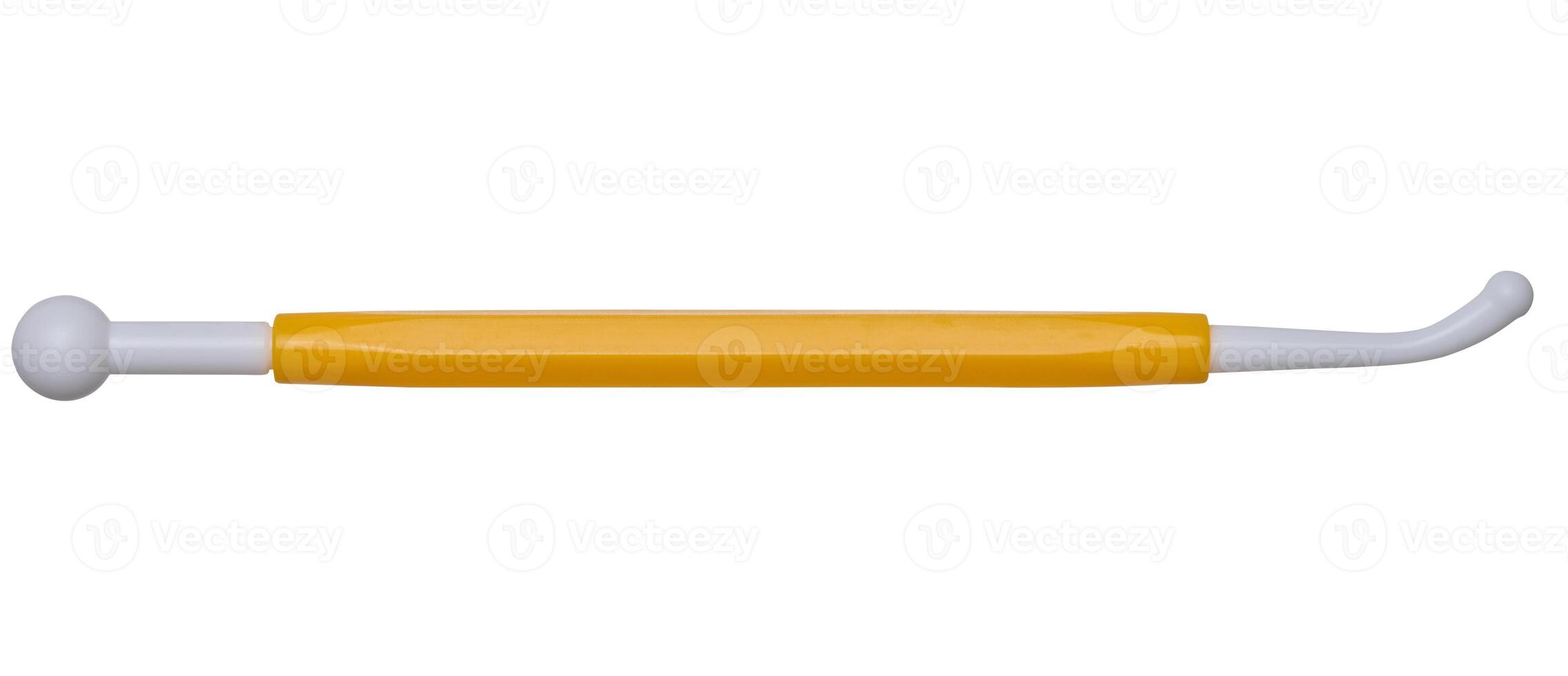 Plastic spatula for modeling plasticine on an isolated background photo