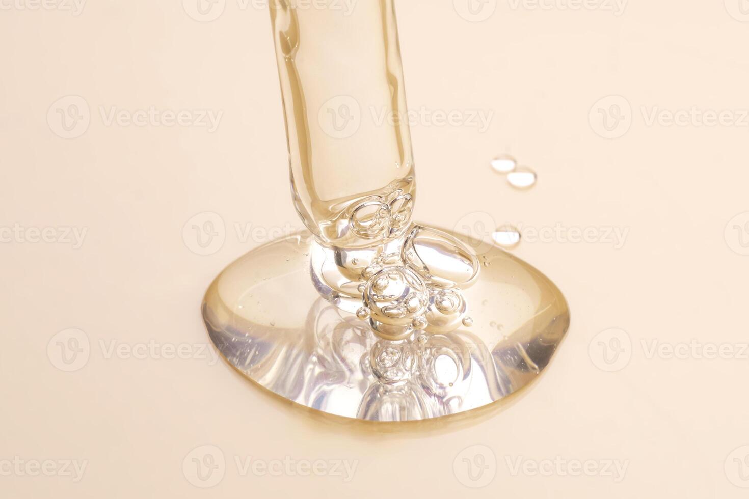 The texture of a cosmetic serum with a pipette closeup. Macrophotography photo