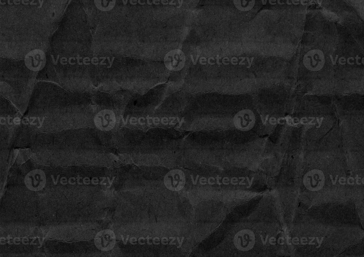 Crumpled black kraft paper texture banner background photo