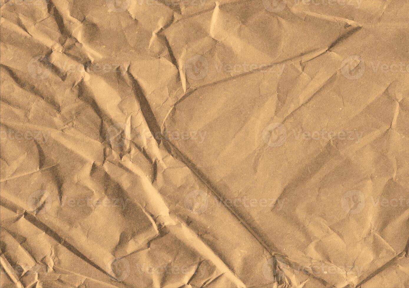 Crumpled brown kraft paper texture banner background photo