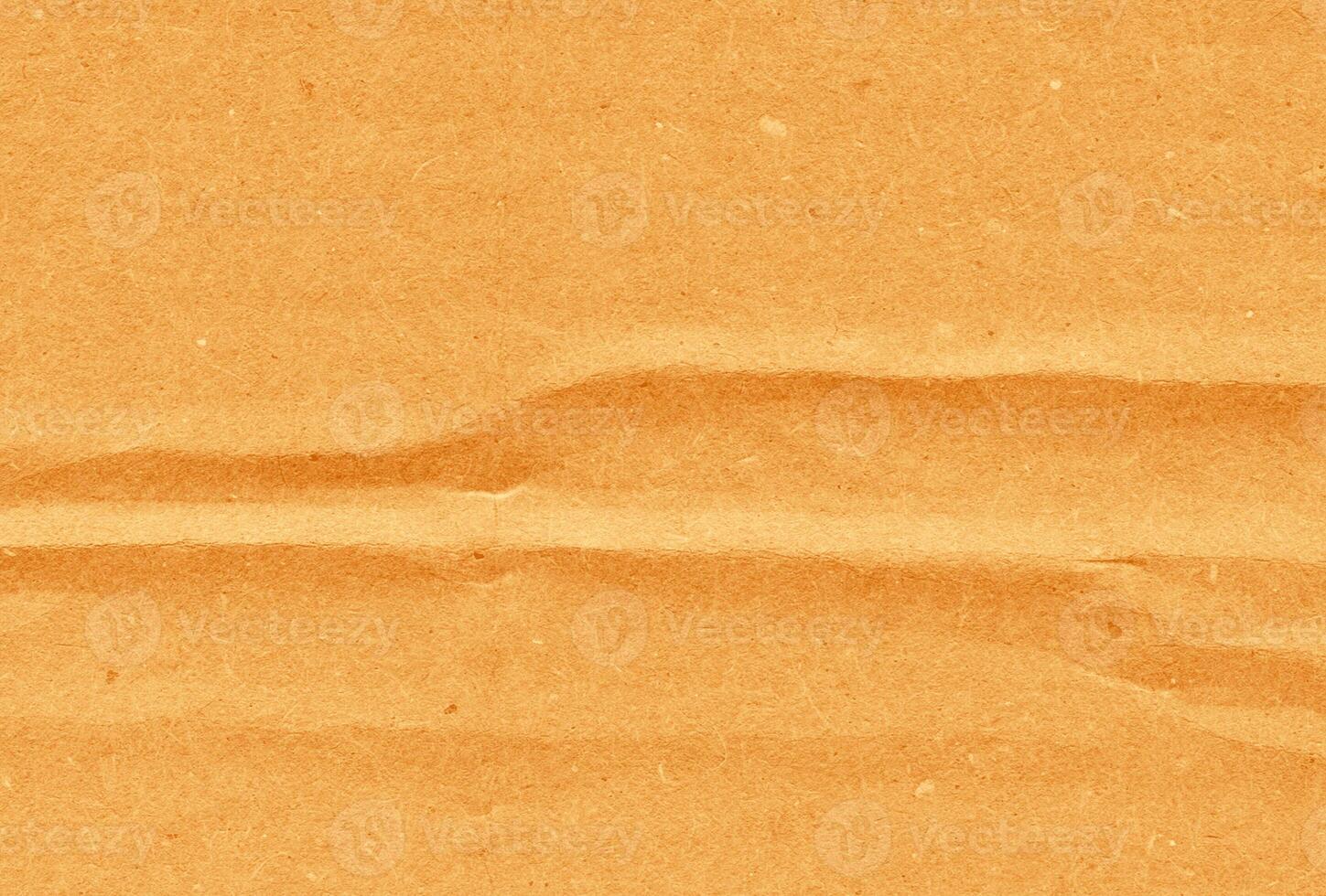 Crumpled brown kraft paper texture banner background photo