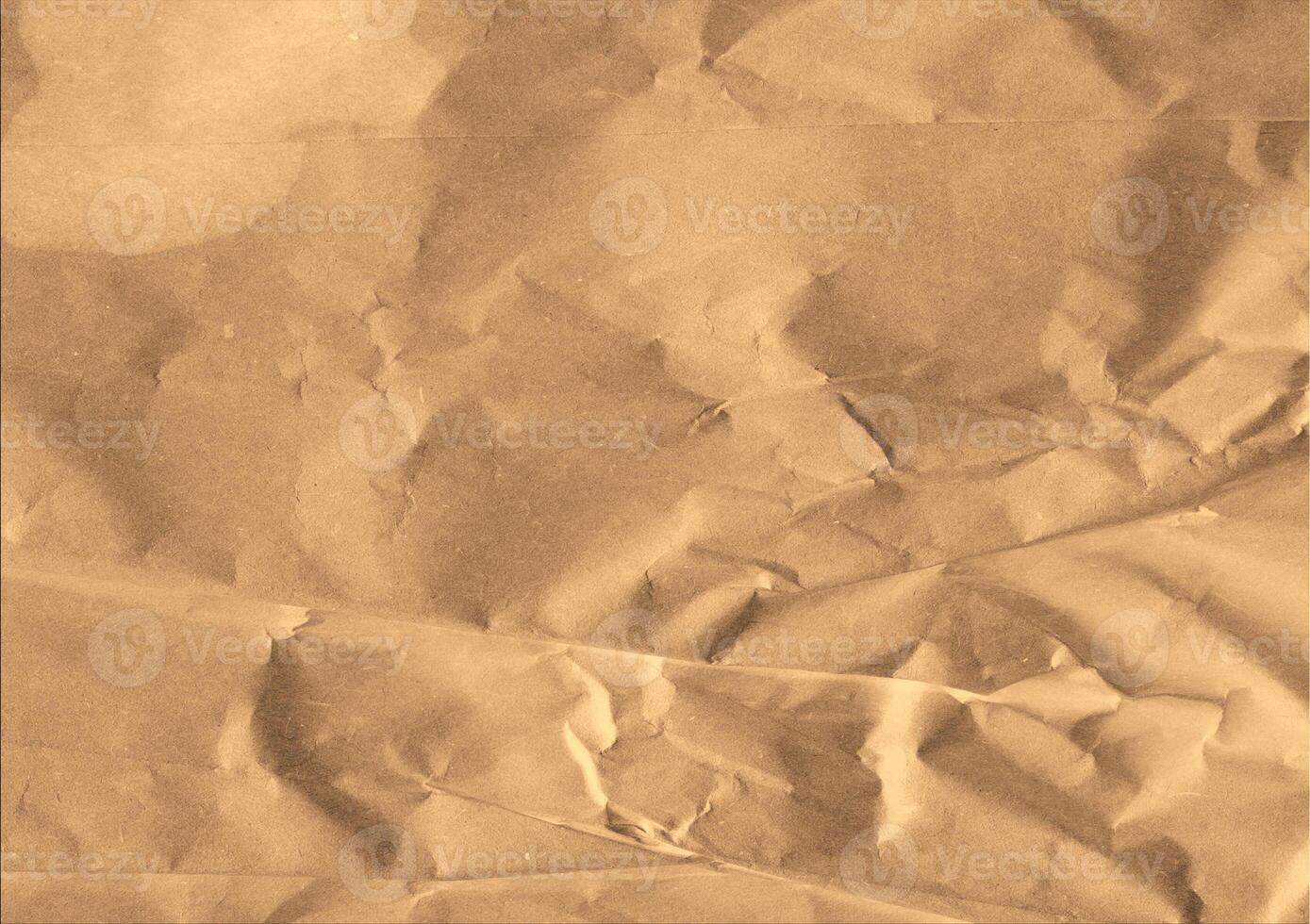 Crumpled brown kraft paper texture banner background photo