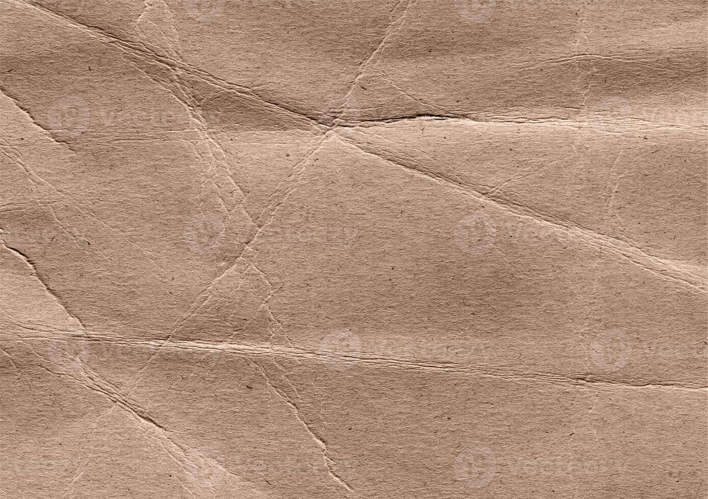 Crumpled brown kraft paper texture banner background photo