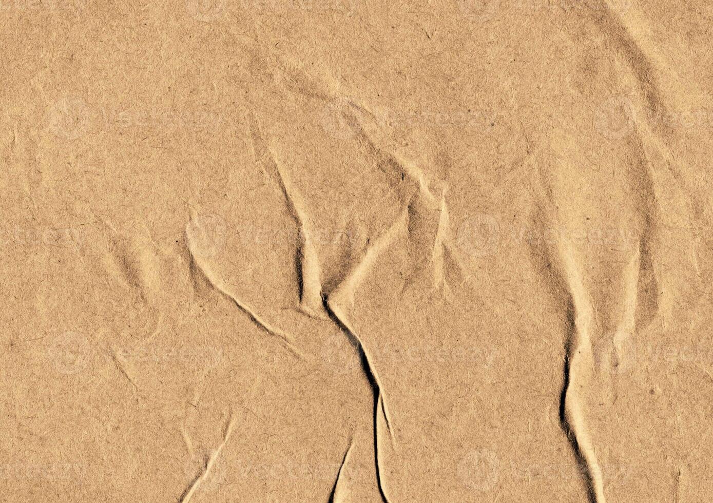 Crumpled brown kraft paper texture banner background photo