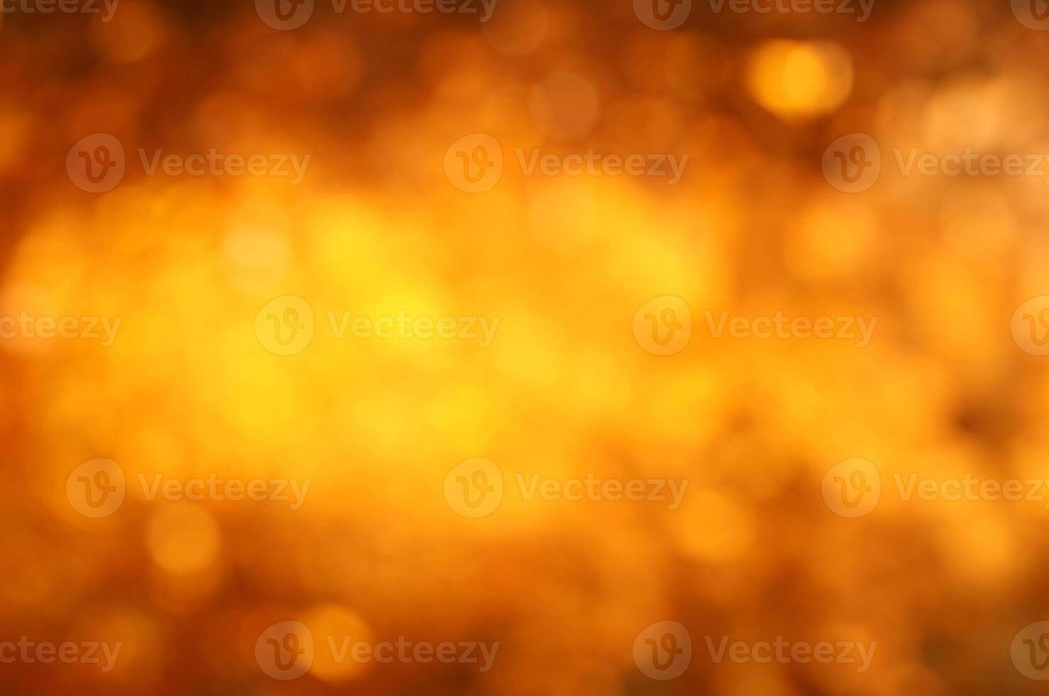 Blurred light gold bokeh abstract background. photo