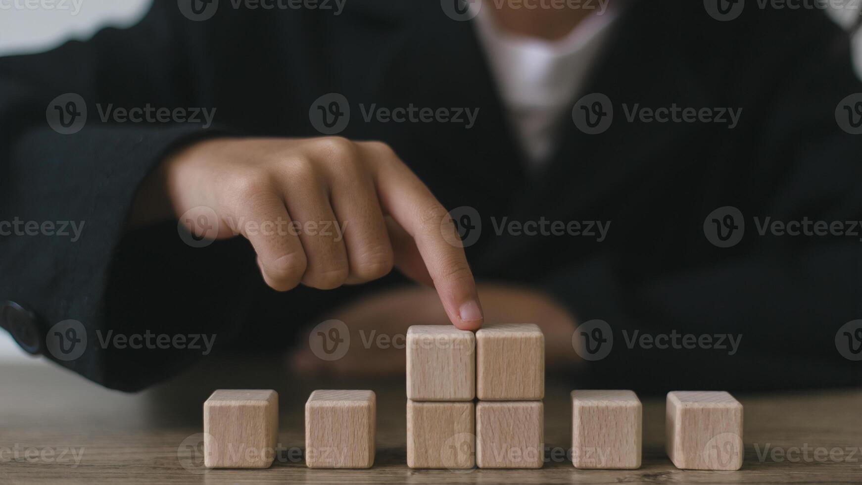 Blank wooden cubes on the table with copy space, empty wooden cubes for input wording, and an infographic icon photo