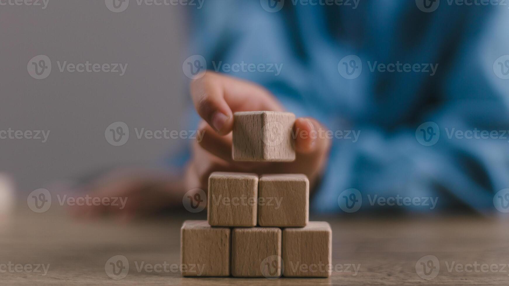 Blank wooden cubes on the table with copy space, empty wooden cubes for input wording, and an infographic icon.. photo