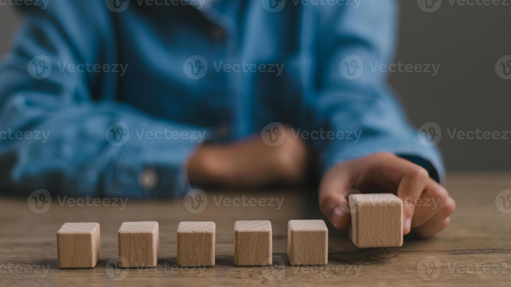 Blank wooden cubes on the table with copy space, empty wooden cubes for input wording, and an infographic icon. photo