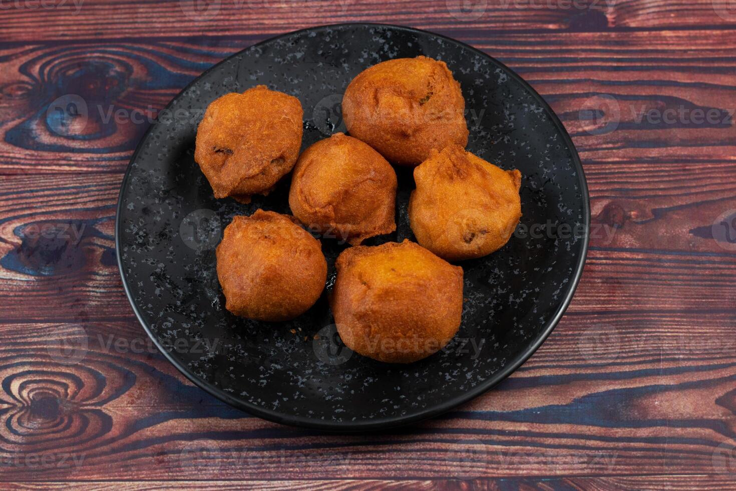 deep fried potato chop served in a dish isolated on table side view photo