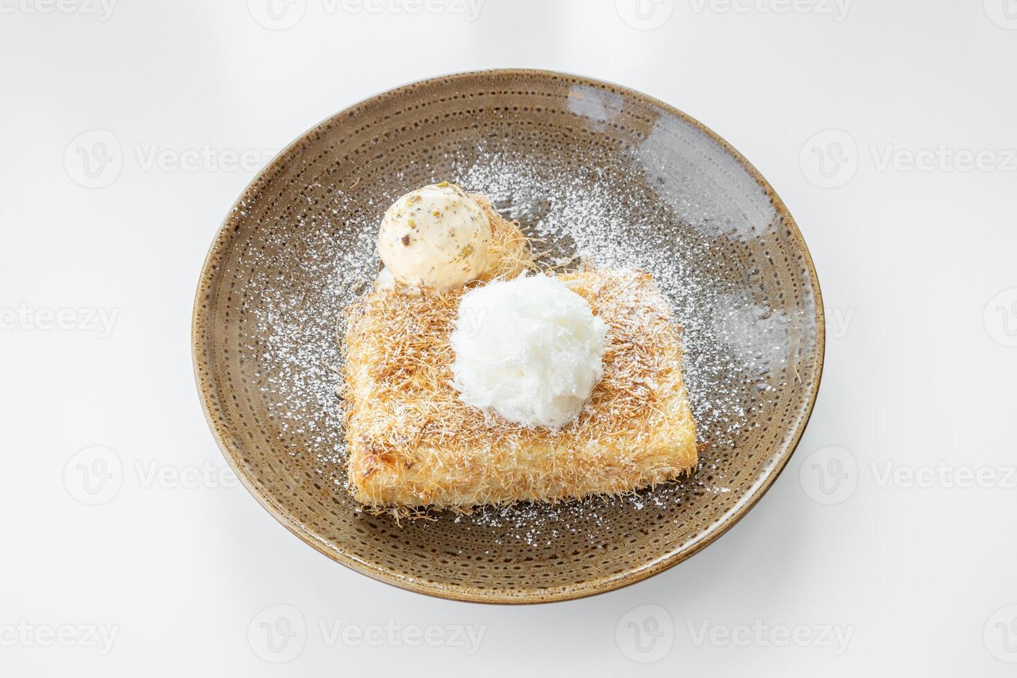 Kunafa French Toast served in a dish isolated on grey background top view photo