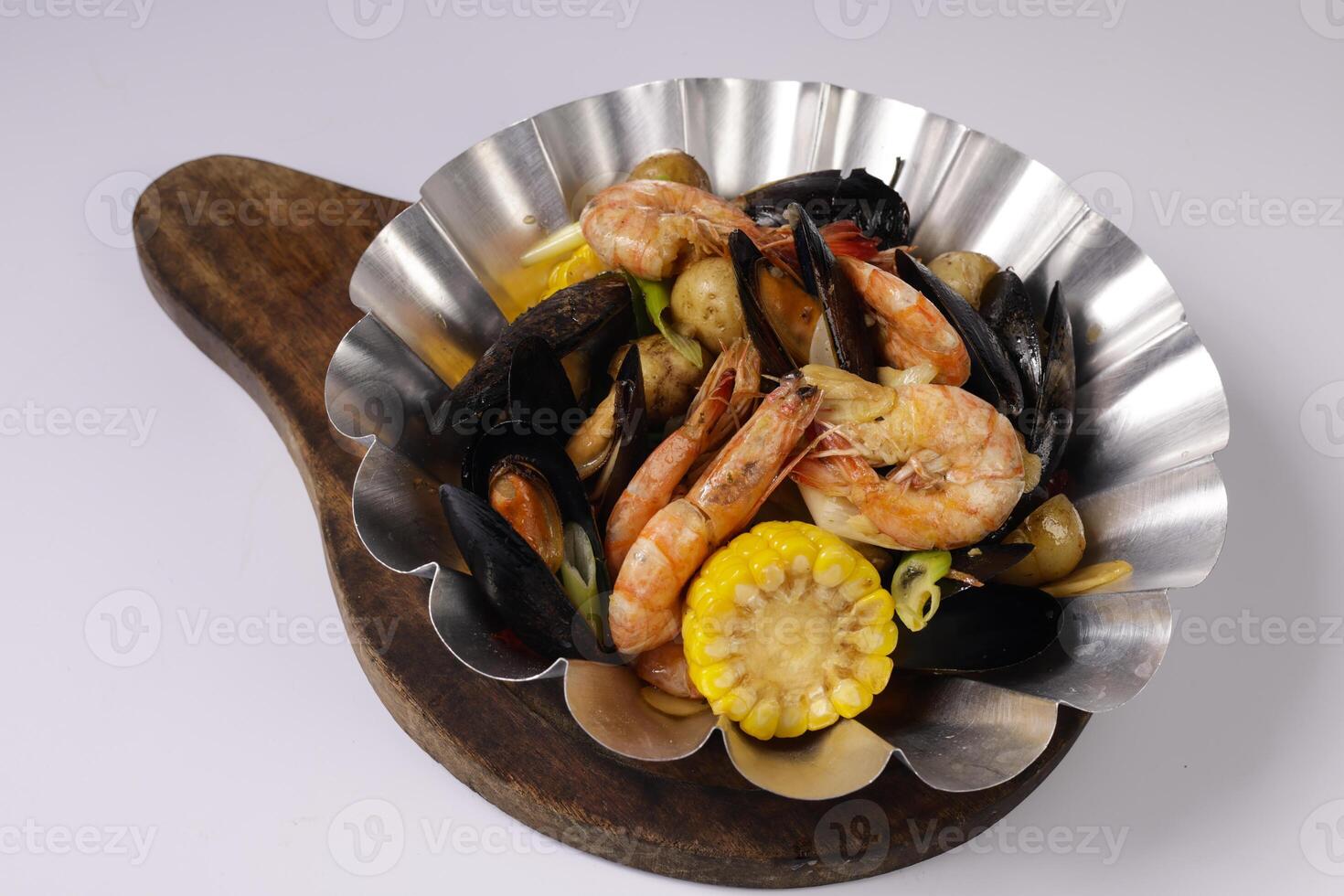 CHILI SAMBAL SHRIMPS BUCKET in a dish top view on grey background singapore food photo