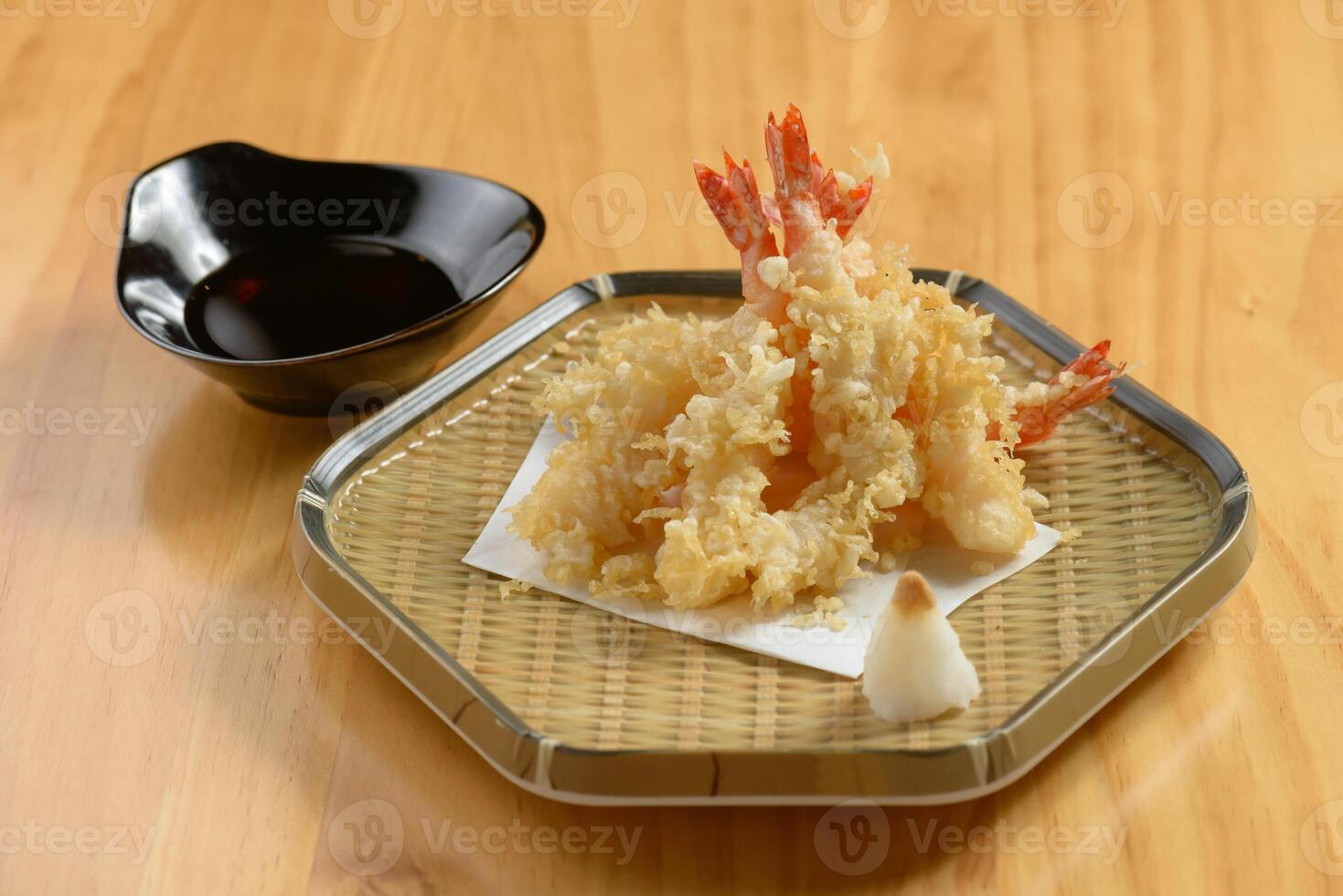 japanese food Deep Fried ebi tempura shrimp in a tray with chili sauce on wooden background top view photo