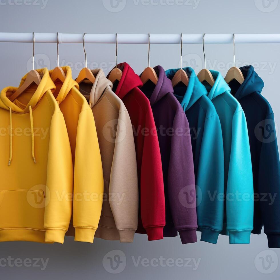 AI generated A row of different colorful youth cashmere sweaters and hoodies, blending comfort and style seamlessly. Ai Generated. photo