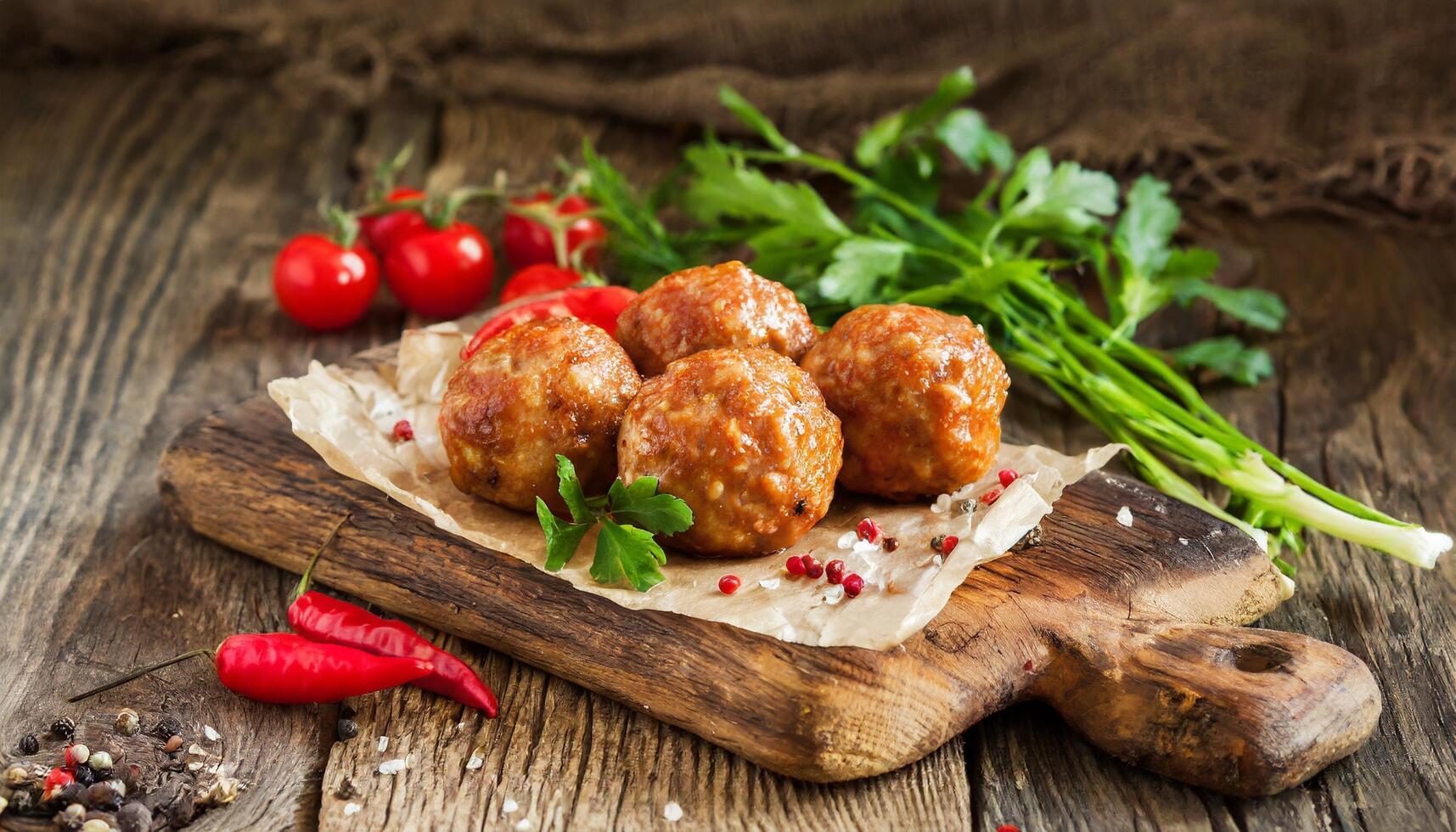 AI generated Juicy meatballs on a wooden base photo