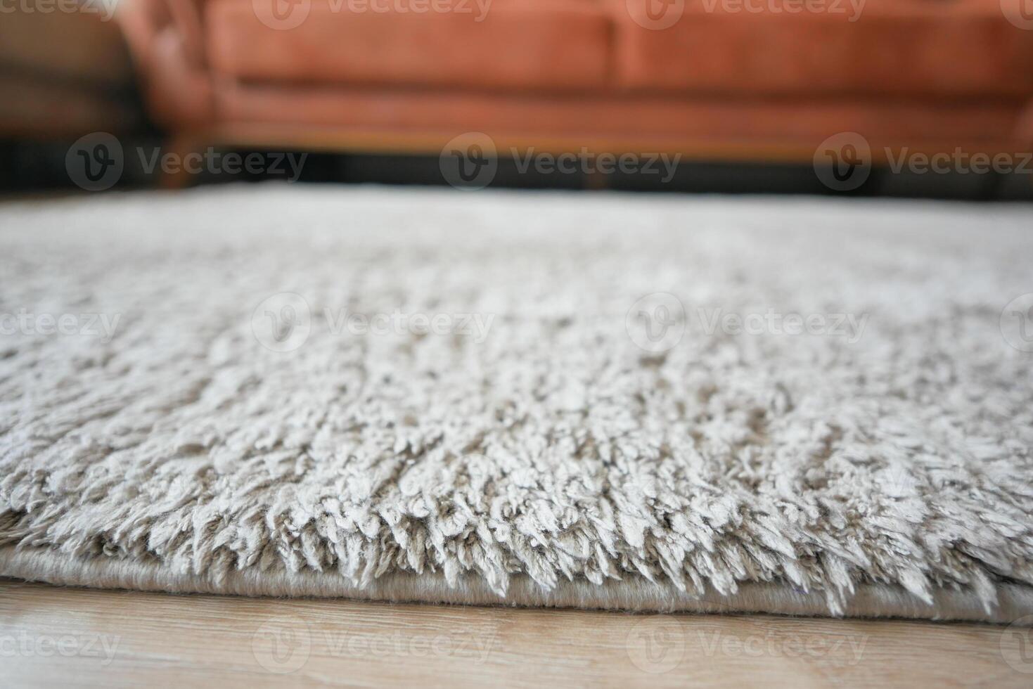 carpet texture background on wooden floor with copy space photo