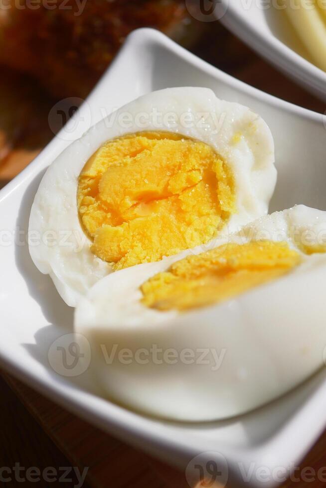 close up of bowel egg in a bowl on table photo