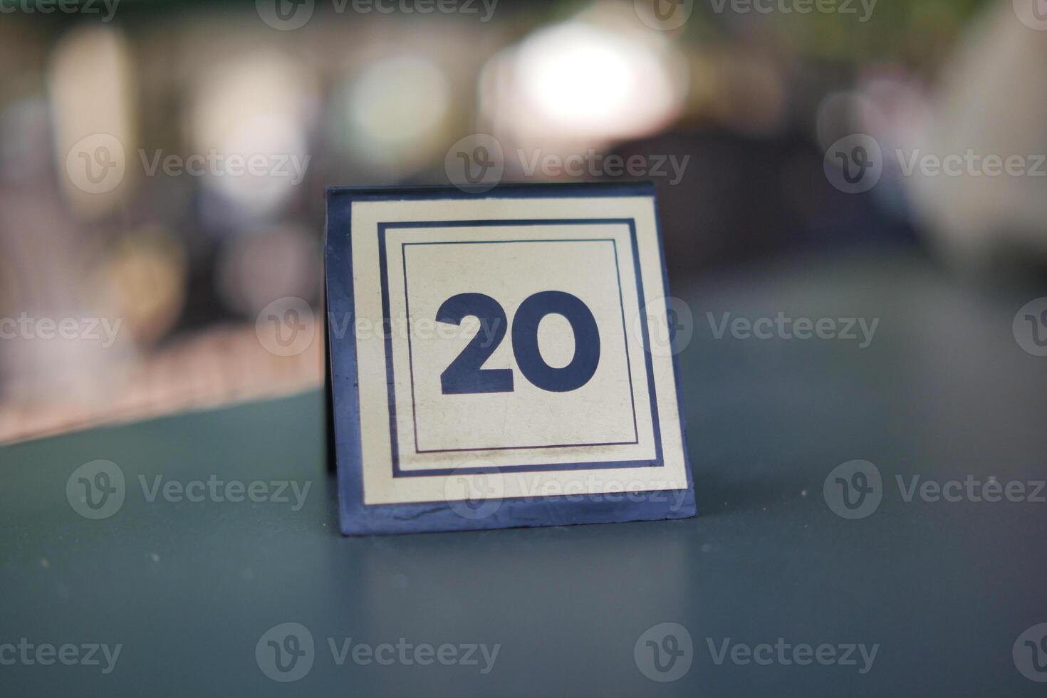 number sign number on cafe table . photo