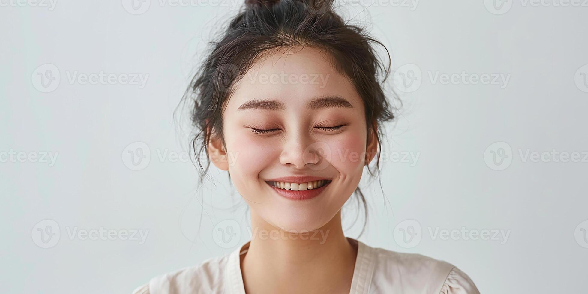 AI generated Portrait of a happy romantic Asian woman waiting for a surprise, with eyes closed and smiling isolated on light background photo