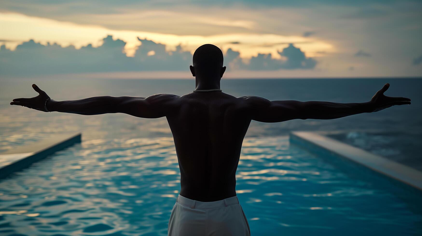 AI generated dark-skinned man embracing the vast blue ocean at sunset, arms outstretched photo