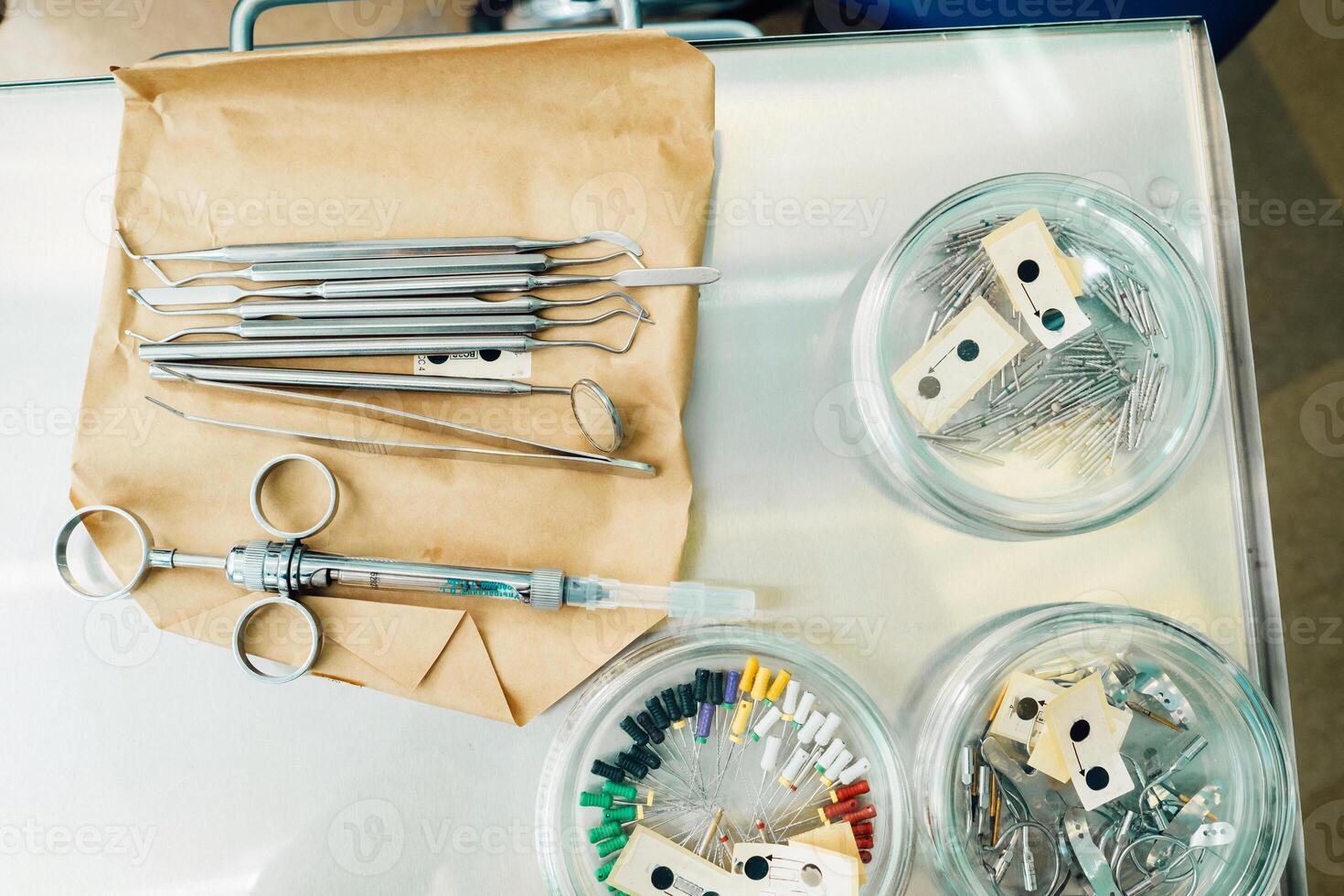 the dentist's tool is on the table before working in his office photo