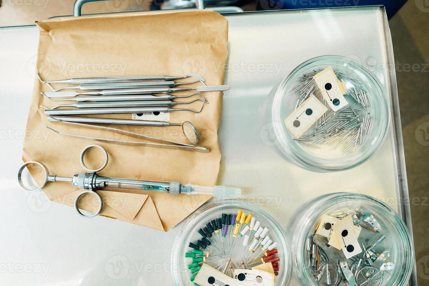 the dentist's tool is on the table before working in his office photo