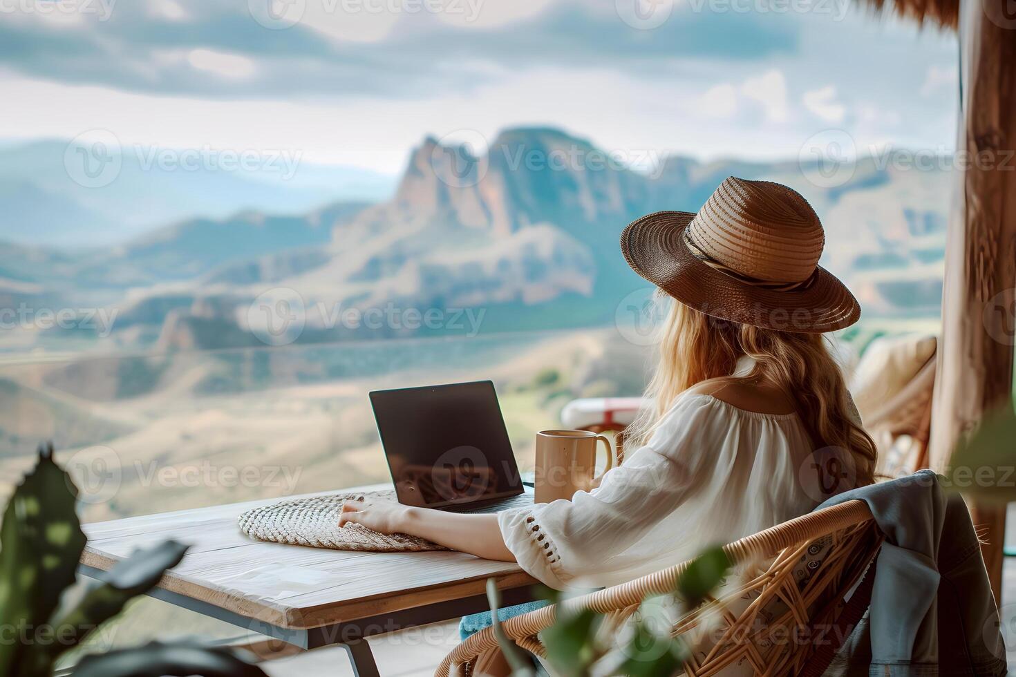 AI generated A woman working on her laptop amidst the beauty of nature while working remotely photo
