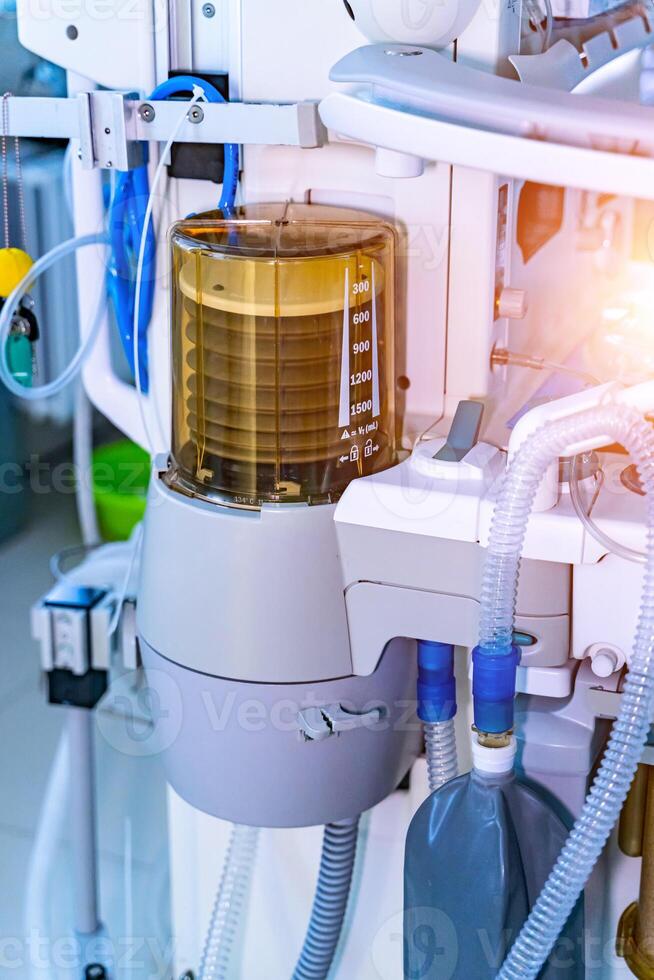 Artificial lung ventilation monitor in the intensive care unit. Nurse with medical equipment. Ventilation of the lungs with oxygen. COVID-19 and coronavirus identification. Pandemic. photo