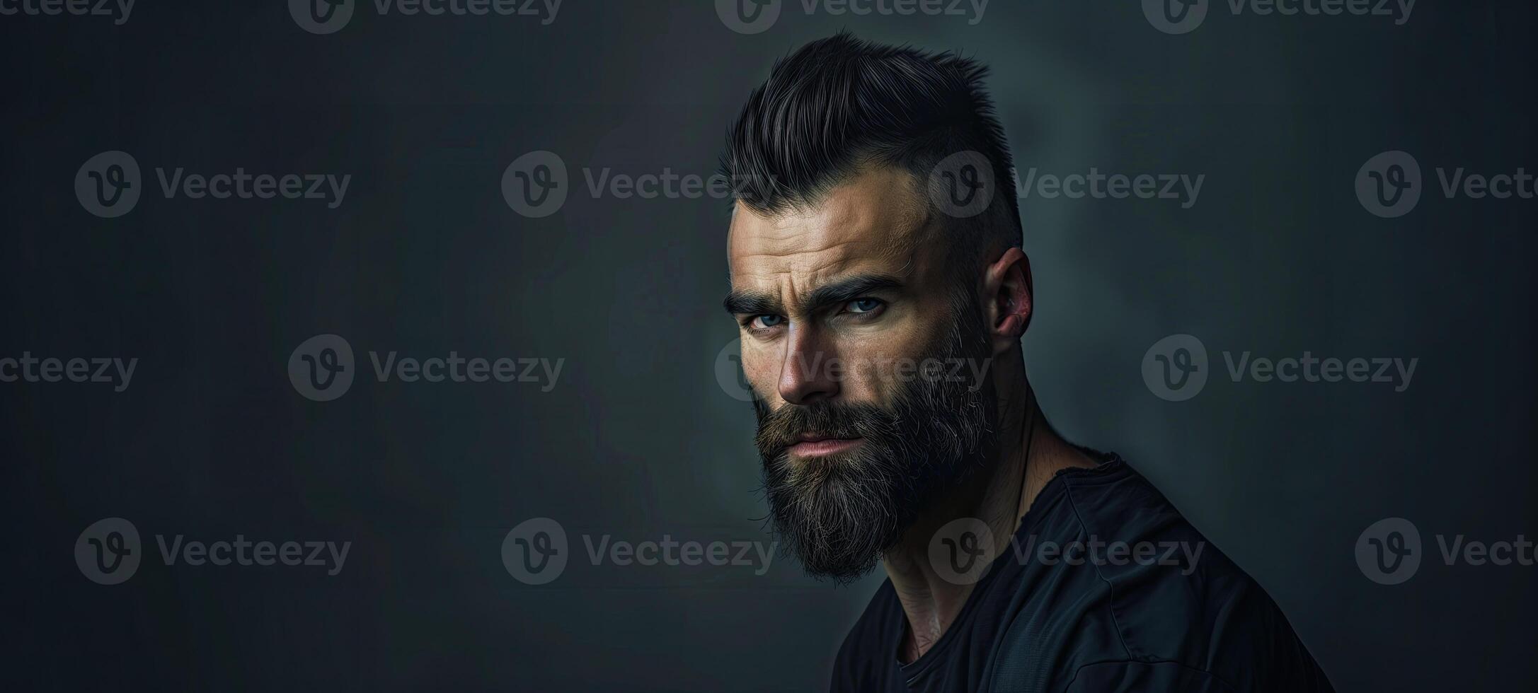AI generated Portrait of a brutal handsome young man with a beard on a black background photo