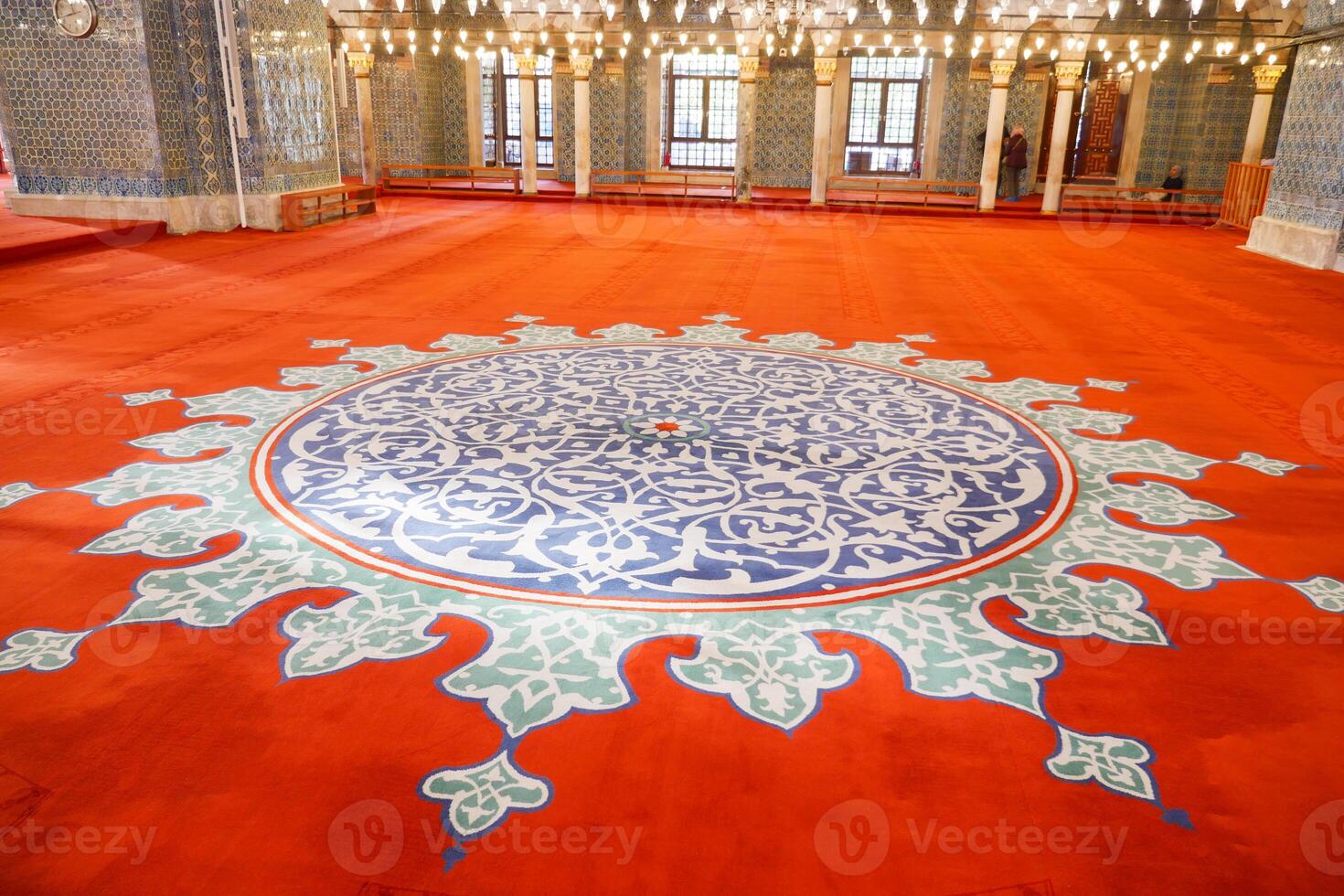 Intricate circular design adorning mosque floor, stunning urban art photo